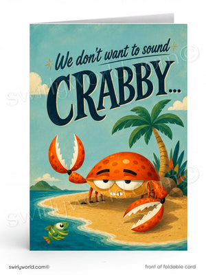 A folded greeting card shown front-on against a white background. The card features a tropical beach illustration with a cartoon crab on sand, palm tree, blue water, and the text 'We don't want to sound CRABBY.