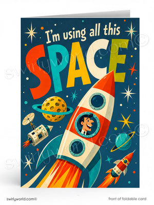 Card with a colorful rocket and space-themed text on a blue background