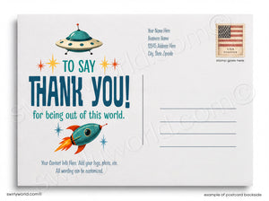 Postcard with space-themed design featuring a UFO and rocket ship, with text 'To say Thank You! for being out of this world.'