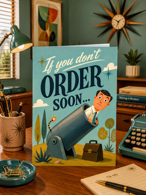 a desk with a book titled "If you don't order soon...", a typewriter, a cup with pens, a clock, and a potted plant.