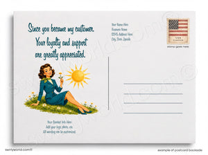 The image is a postcard featuring a woman sitting on a grassy field with flowers, and there is a stamp in the top right corner.
