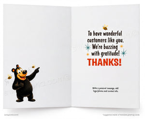 A greeting card with a cartoon bear pointing and a message expressing gratitude.