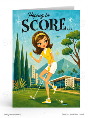 A folded greeting card shown standing upright on a white background. The front features a retro-style illustration of a woman in a yellow polo shirt and white skirt putting on a golf course, with the text 'Hoping to SCORE.