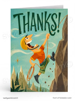 A foldable greeting card shown front-facing on a white background. The card features a retro-style illustration of a smiling rock climber hanging from a rope next to a cliff, with the word 'THANKS!' in large dark green letters across the top.