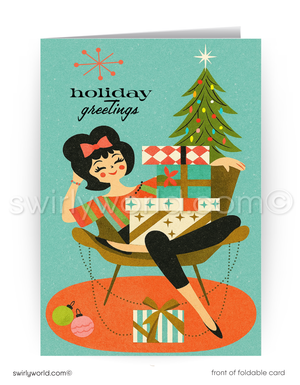 Vintage-style holiday card with a woman sitting in a chair surrounded by presents and a Christmas tree.