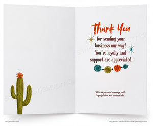 An open greeting card with a white interior. The left panel shows a simple green cactus with small orange flowers near the bottom left.