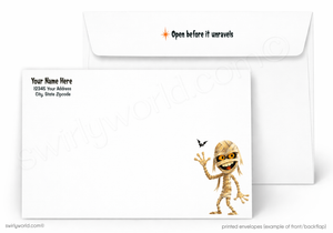 A white printed envelope set shown on a white background, with the front of one envelope featuring a cartoon mummy character and the back showing placeholder address text, and a second envelope behind it with the flap printed with the words 'Open before it unravels'.