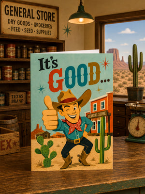 A greeting card featuring a cartoon cowboy giving a thumbs up, with a desert landscape and a sign for a general store in the background.