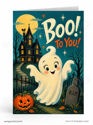 A folded Halloween greeting card shown front-facing on a white background. The card features a spooky haunted house, a smiling white ghost, a carved pumpkin, a tombstone reading R.