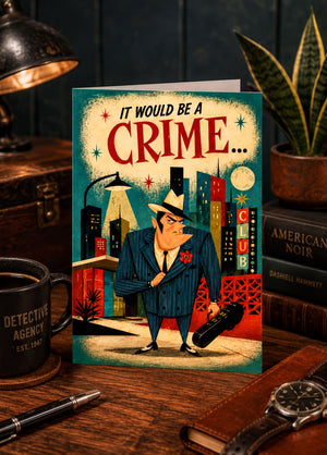 a card with a cartoon illustration of a man dressed in a suit and tie, standing in front of a cityscape with a "CRIME..." message. The card is placed on a wooden surface, surrounded by various objects such as a mug, a pen, a book, and a plant.
