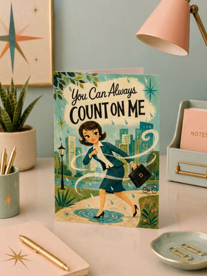 a card with a woman in a business suit, surrounded by a cityscape and rain, with the text "You Can Always Count on Me" displayed prominently.
