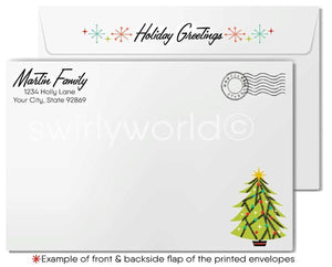 The image is a white envelope with a Christmas tree illustration and a holiday greeting. The envelope is addressed to "Martin Family" and has a postmark. The envelope is designed to be used as a holiday greeting card.