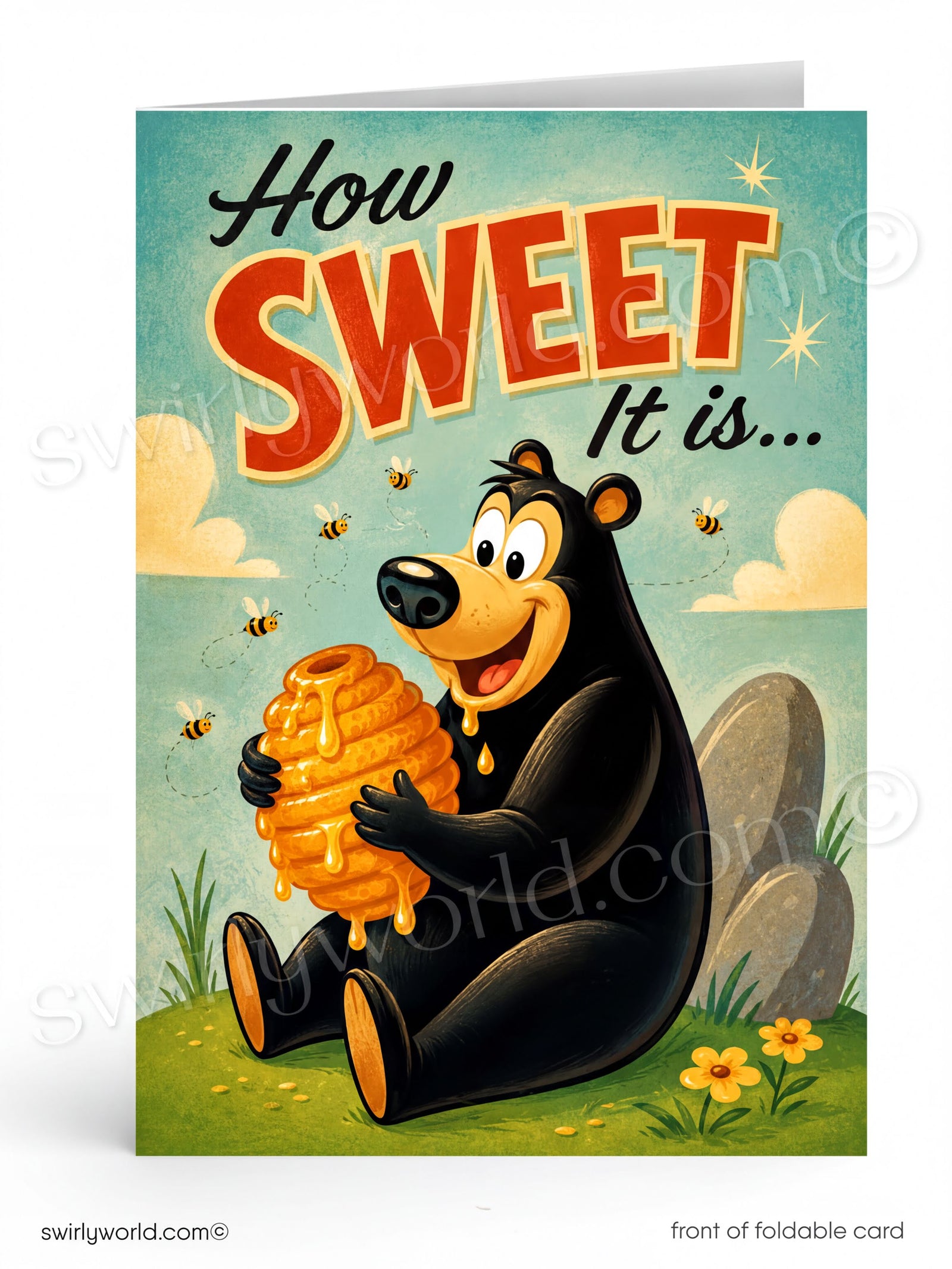 A black bear sitting on the grass and holding a honeycomb with honey dripping from it.
