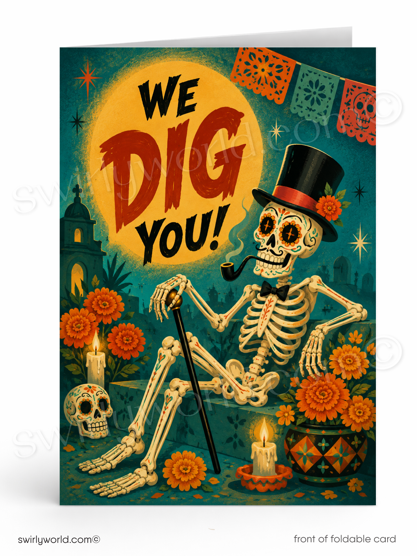 A folded greeting card shown upright on a white background. The front features a colorful Day of the Dead style illustration with a skeleton wearing a black top hat and bow tie, seated among orange flowers and candles, with the text 'WE DIG YOU!' over a large yellow moon.