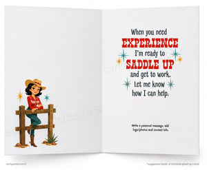 An open greeting card with a western-themed illustration and printed message. The left panel shows a cartoon woman in a cowboy hat leaning on a wooden fence.