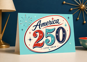 A greeting card with the text "America 250" and a design featuring stars and fireworks.
