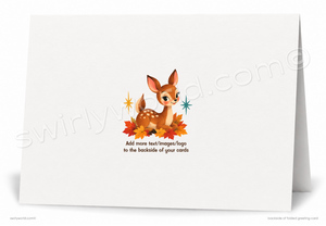 A folded white greeting card shown standing open against a white background. The back side features a cute cartoon deer surrounded by autumn leaves and small star accents, with placeholder text reading 'Add more text/images/logo to the backside of your cards.