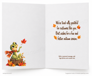a greeting card with a frog sitting on a tree stump and holding a red maple leaf. The card has a personal message and a wish for a fun and festive autumn season.