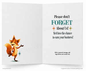 An open greeting card with a white background. The left panel shows a cartoon orange fox holding a phone, and the right panel contains printed text that reads, 'Please don't FORGET About Us! We'd love the chance to earn your business!' with small decorative stars.