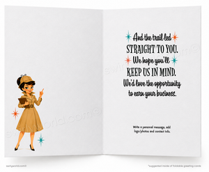 An open greeting card with a vintage-style illustration of a woman in a tan dress and hat on the left page and a motivational quote on the right page. Small decorative starburst accents appear around the text.