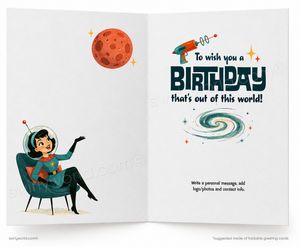 An open greeting card with a retro space-themed birthday design. The left panel shows an illustration of a woman in a space suit sitting in a chair near a red planet.