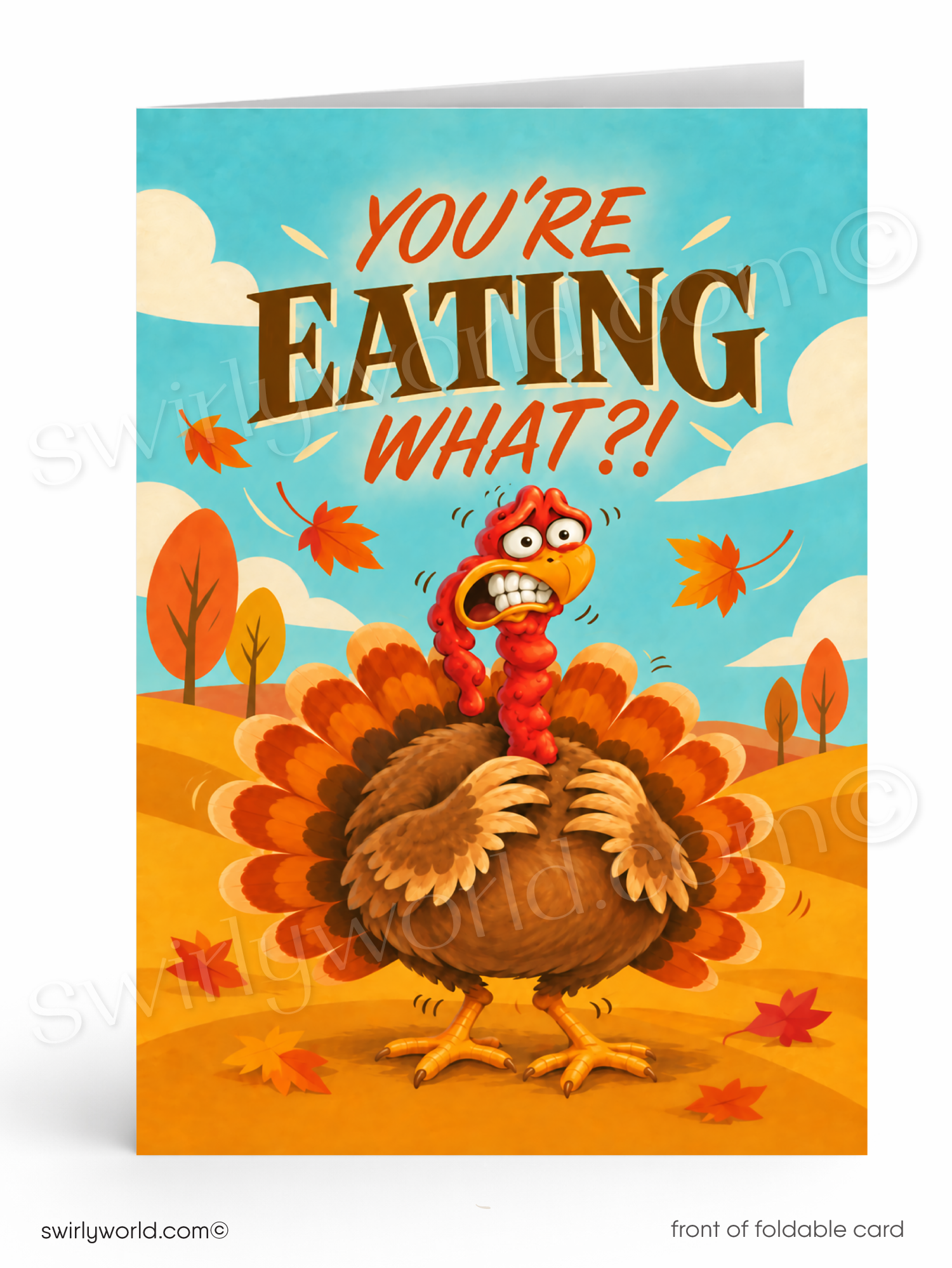 A folded greeting card shown front-on against a white background. The card features a cartoon angry turkey in autumn colors with the text 'YOU'RE EATING WHAT?!' in large orange and brown lettering.