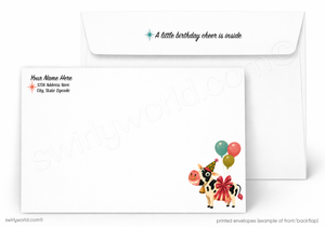 A printed white envelope set shown on a light background. The front envelope has a cartoon cow wearing a party hat and bow tie with colorful balloons, and the back envelope has placeholder text for name and address plus a small star icon and the phrase 'A little birthday cheer is inside'.