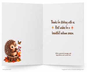 An open greeting card with a white interior. The left panel shows a cute hedgehog sitting on a tree stump surrounded by autumn leaves and a butterfly.