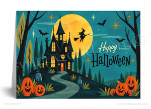 A folded greeting card featuring a stylized Halloween night scene with a haunted house, full moon, bats, pumpkins, and the text 'Happy Halloween'.