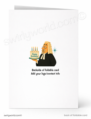 A folded greeting card shown front and back on a white background. The front features a cartoon judge in a black robe holding a birthday cake with candles and the words 'Happy Birthday.