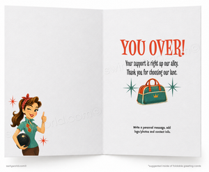 Open card with illustration of a woman and text 'YOU OVER!' on a white background