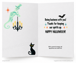 An open folding greeting card with Halloween-themed illustrations and text. The left panel shows a pale green ghost holding a black candelabra, and the right panel reads, 'Doing business with you! Thanks for keeping our spirits up.