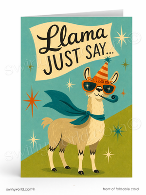 A folded greeting card shown front-on against a white background. The card features a stylized llama wearing a party hat, dark sunglasses, and a teal cape, with a cream banner reading 'Llama JUST SAY.