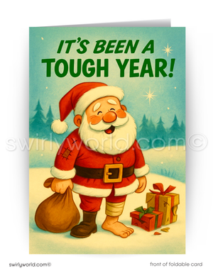 Card with Santa Claus holding a sack and gift, text 'It's Been a Tough Year!', snowy landscape background.