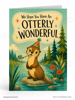 A folded greeting card shown front-facing on a white background. The card features a whimsical illustration of an otter sitting on a rock by a river, wearing a party hat and blowing a party horn, with the text 'We Hope You Have An Otterly Wonderful' above it.