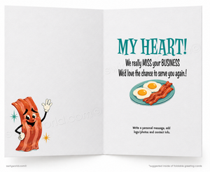 An open greeting card design with a white background, featuring a cartoon bacon character on the left panel and a message on the right panel that reads 'MY HEART! We really MISS your BUSINESS We'd love the chance to serve you again!' with a plate of eggs and bacon illustration.