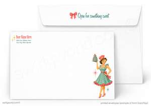 A set of white stationery envelopes shown on a light gray background. The front envelope features a retro-style illustration of a woman in a green dress holding a cake, and the back envelope has placeholder text for a name and address with the phrase 'Open for something sweet' in teal with a red bow.