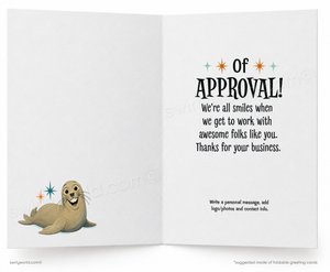 Open card with a cartoon seal and text on a white background