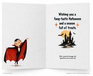 An open folding greeting card design for Halloween, with a cartoon vampire on the left panel and a haunted house scene with the text 'Wishing you a fang-tastic Halloween and a season full of treats.' on the right panel.