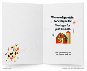 An open greeting card shown front and back on a white background. The left panel has a cartoon cow illustration, and the right panel has printed text reading, 'We're really grateful for every order! Thank you for your business.