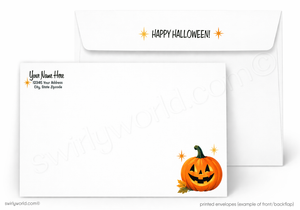 White Halloween-themed printed envelopes shown on a light gray background. The front envelope features a smiling jack-o'-lantern with small orange stars, and the back envelope has 'HAPPY HALLOWEEN!' with orange stars.