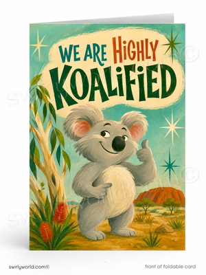 A folded greeting card shown upright, featuring a retro-style illustration of a koala standing in an Australian landscape with the text 'WE ARE HIGHLY KOALIFIED' on the front.