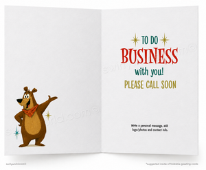 An open greeting card with a white interior. The left panel shows a cartoon brown bear wearing a red bandana and gesturing with one paw.