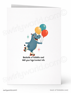 A folded white greeting card shown front and back on a white background. The front features a cartoon blue hippo holding yellow, teal, and red balloons, with small sparkles.