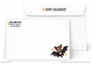 White Halloween-themed printed envelopes shown on a light graybackground. The front envelope has a cute cartoon bat illustration in the lower right corner with small orange sparkles, and the back envelope has the text 'HAPPY HALLOWEEN!' printed near the top.