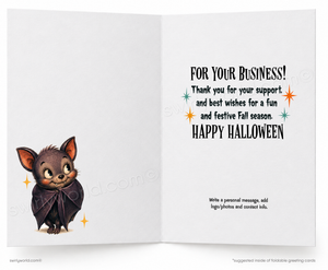 An open greeting card with a white background, featuring a cute cartoon bat on the left panel and a printed Halloween message on the right panel. Small decorative star and sparkle graphics appear around the text.