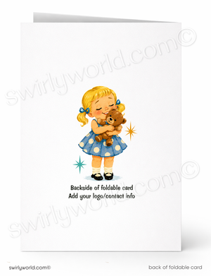 A folded white card shown front and back. The front features a cute illustration of a blonde girl in a blue polka-dot dress hugging a brown teddy bear, with small star accents.
