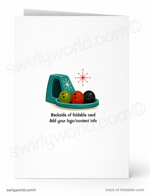 A folded greeting card shown front and back on a white background. The front features a retro bowling illustration with teal pins, three bowling balls in green, red, and black, and a red starburst.