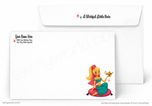 A printed white envelope set shown on a light gray background. The front envelope has a cartoon illustration of a woman in a teal and pink outfit holding a gold lamp, with sample text fields on the left and a note on the flap reading 'A Wicked Little Note.