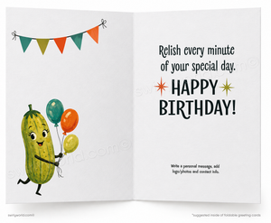 An open greeting card with a white interior. The left panel shows a smiling green zucchini character holding colorful balloons under a string of triangular flags.